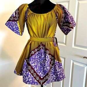 Authentic African printed free size blouse with a belt.